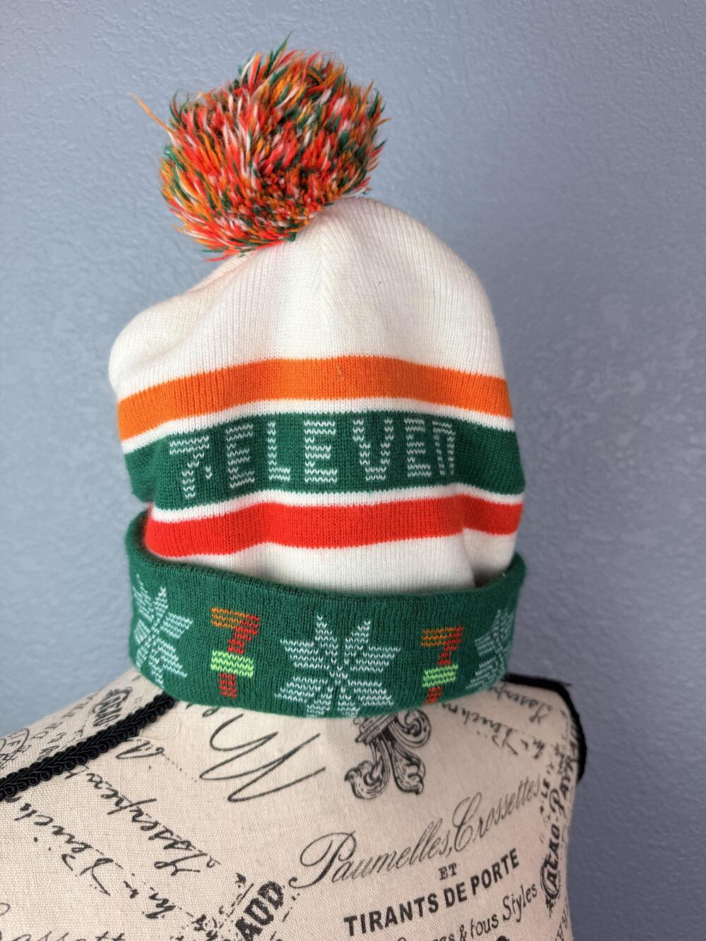 7-Eleven Hat Beanie Knit One Size Green Stripe Fair Isle Pom Christmas Holiday